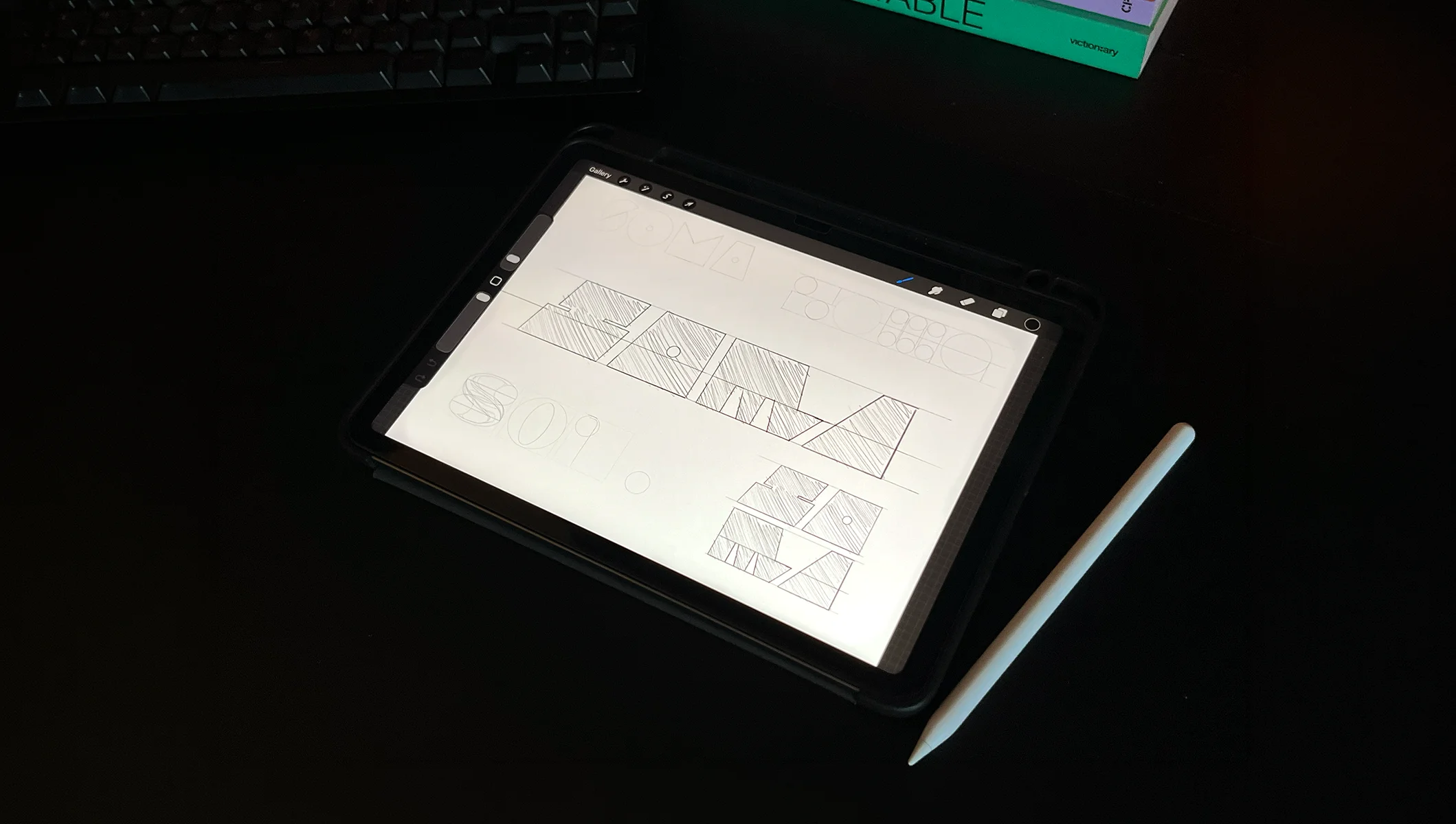 Proces tworzenia znaku, szkic logotypu Soma na tablecie.